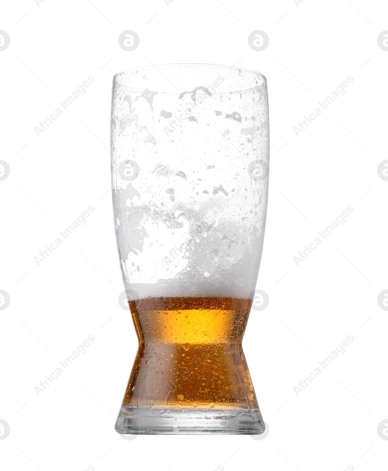 Photo of Half full glass of beer isolated on white