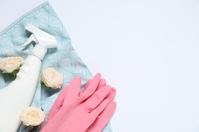 Photo of Spring cleaning. Detergent, supplies and flowers on white background, flat lay. Space for text