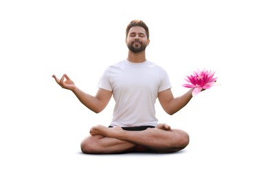 Image of Man meditating with beautiful lotus flower in his hand on white background. Padmasana (yoga lotus position)