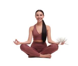 Image of Woman practicing yoga with beautiful lotus flower in her hand on white background. Padmasana (lotus position)