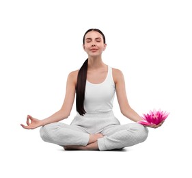 Woman meditating with beautiful lotus flower in her hand on white background. Padmasana (yoga lotus position)