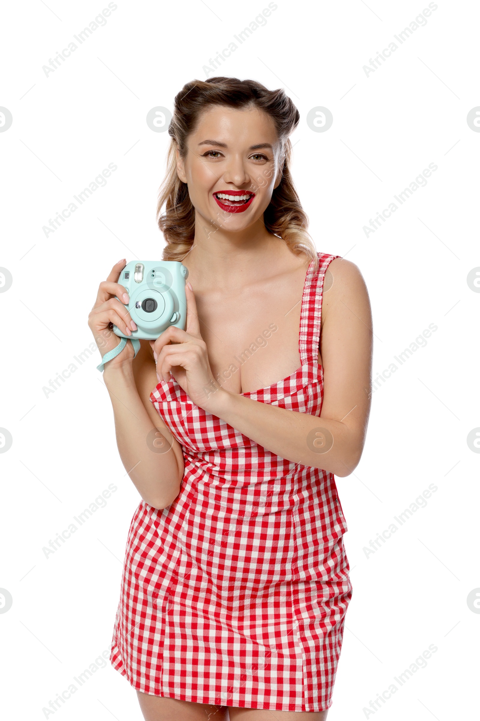 Photo of Happy pin-up woman with camera on white background