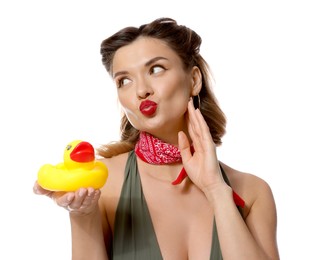 Photo of Attractive pin-up woman with rubber duck on white background