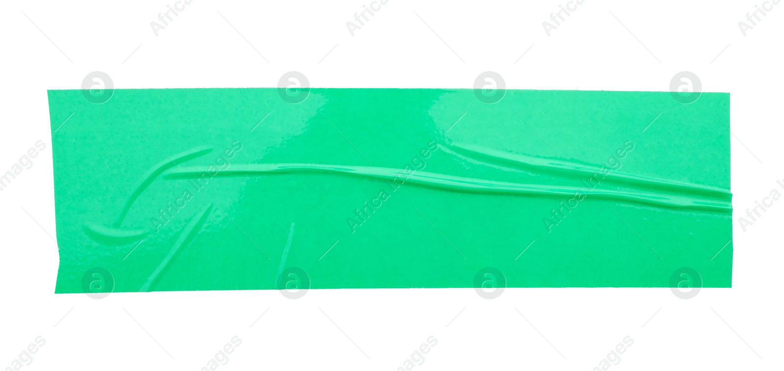 Photo of Strip of green adhesive tape isolated on white, top view