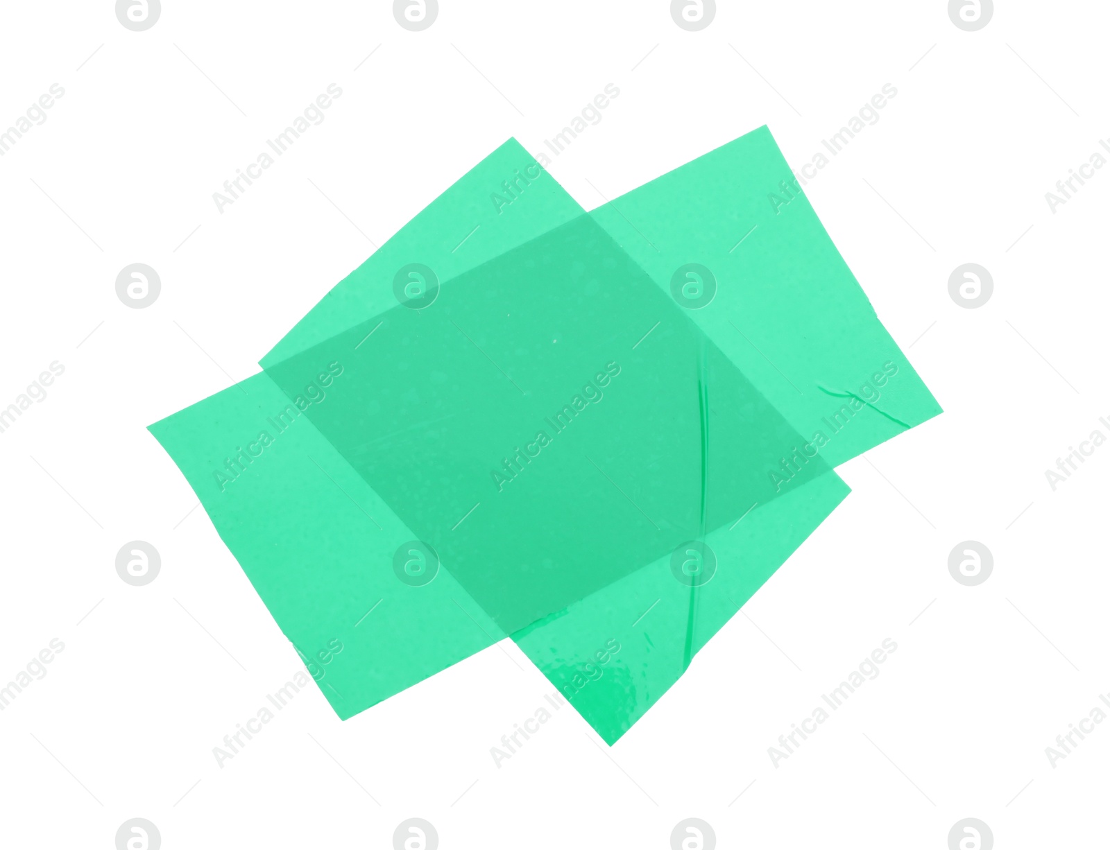 Photo of Strips of green adhesive tape isolated on white, top view