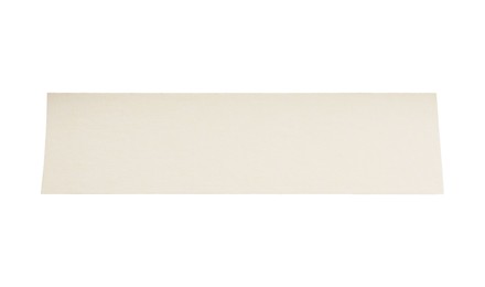 Photo of Strip of masking tape isolated on white, top view