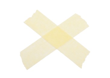 Photo of Cross made with masking tape isolated on white, top view