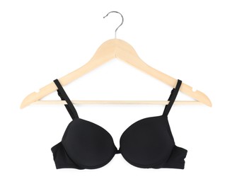 Photo of Beautiful black bra on hanger against white background