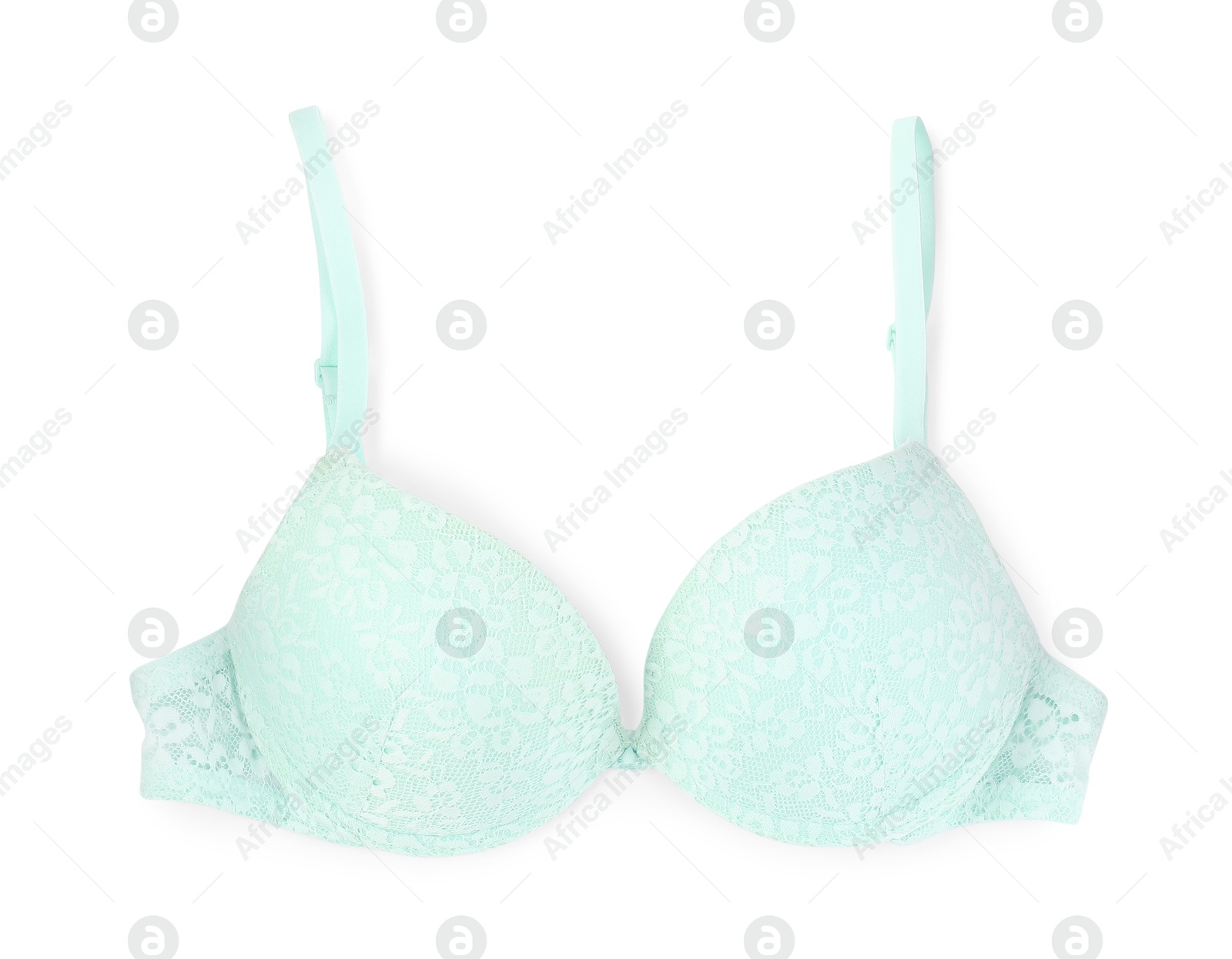 Photo of Beautiful turquoise bra isolated on white, top view