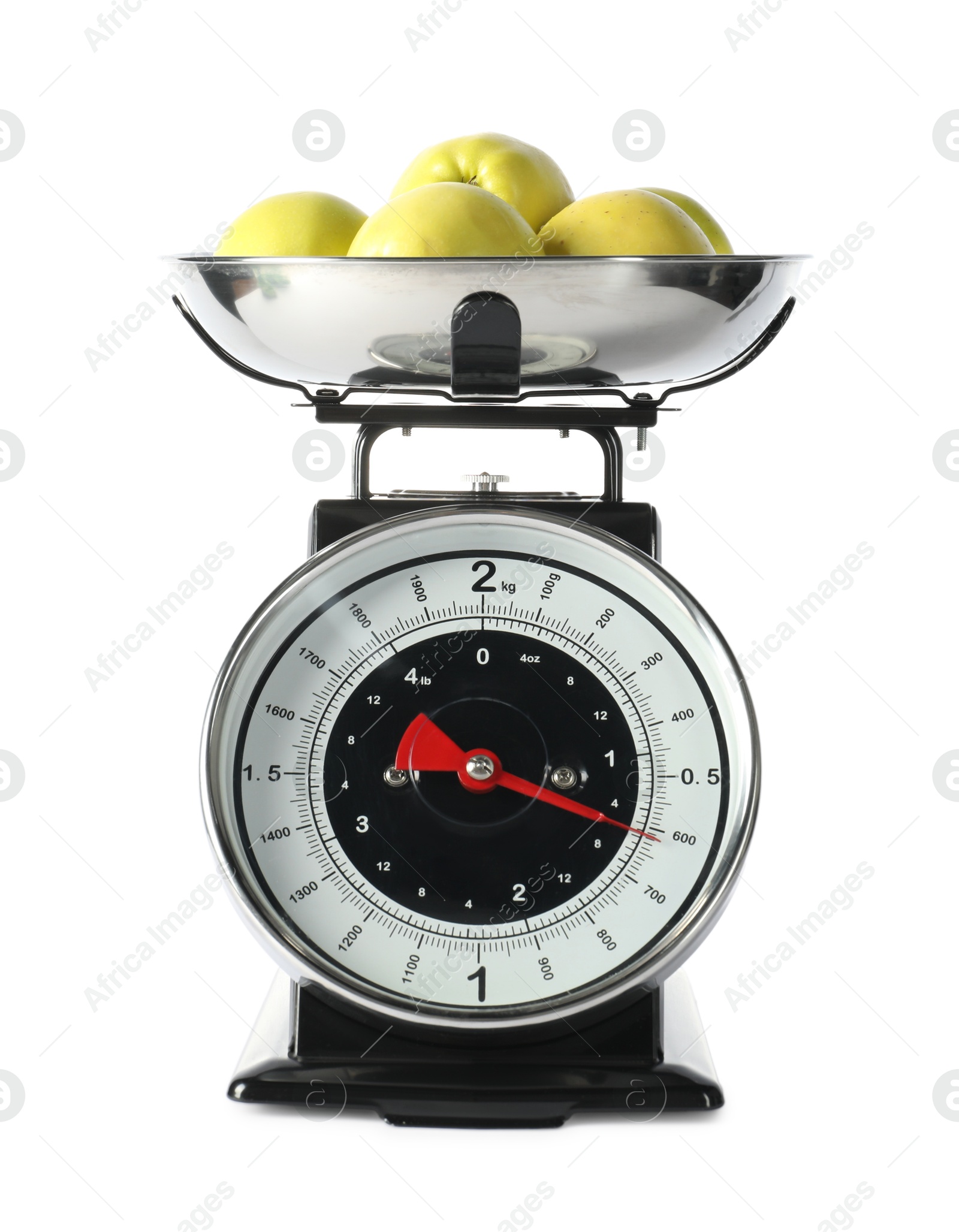 Photo of Retro mechanical kitchen scale with apples isolated on white