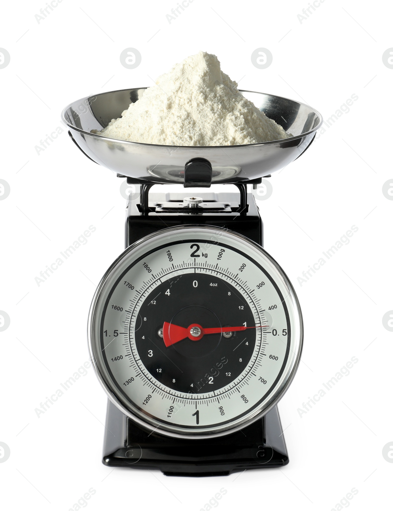 Photo of Retro mechanical kitchen scale with flour isolated on white