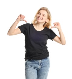 Photo of Young woman wearing blank black t-shirt on white background. Mockup for design