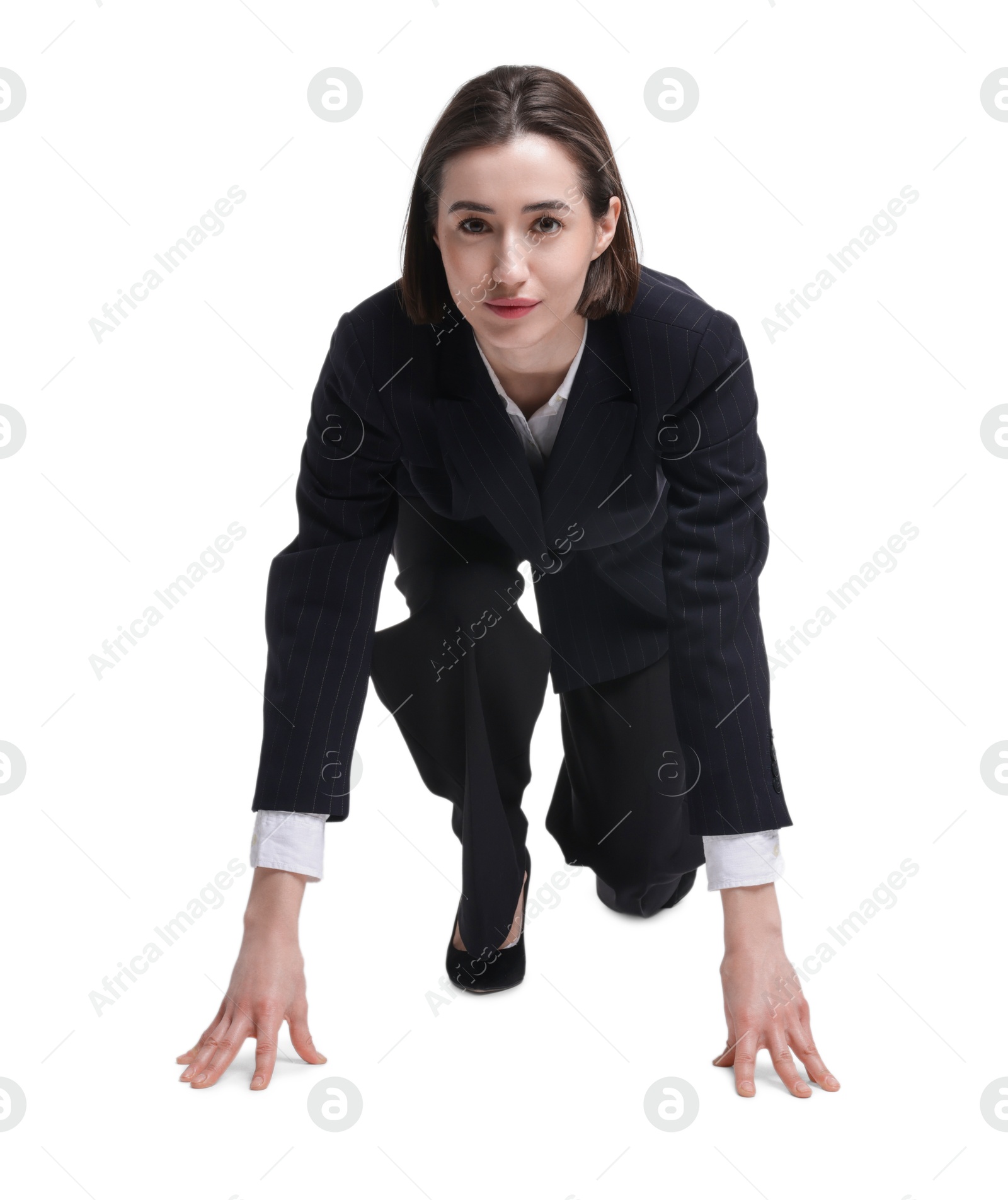 Photo of Businesswoman in starting position for run ready for competition on white background