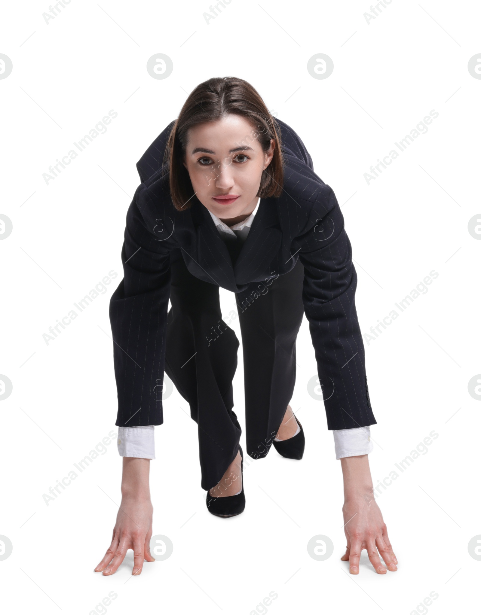 Photo of Businesswoman in starting position for run ready for competition on white background