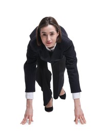 Photo of Businesswoman in starting position for run ready for competition on white background