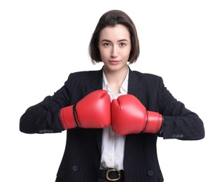 Photo of Competition. Businesswoman in suit wearing boxing gloves on white background