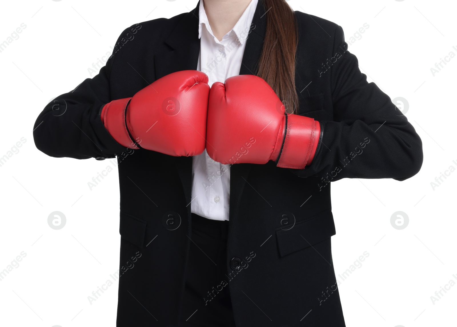 Photo of Competition. Businesswoman in suit wearing boxing gloves on white background, closeup