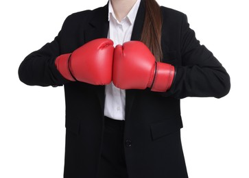 Photo of Competition. Businesswoman in suit wearing boxing gloves on white background, closeup