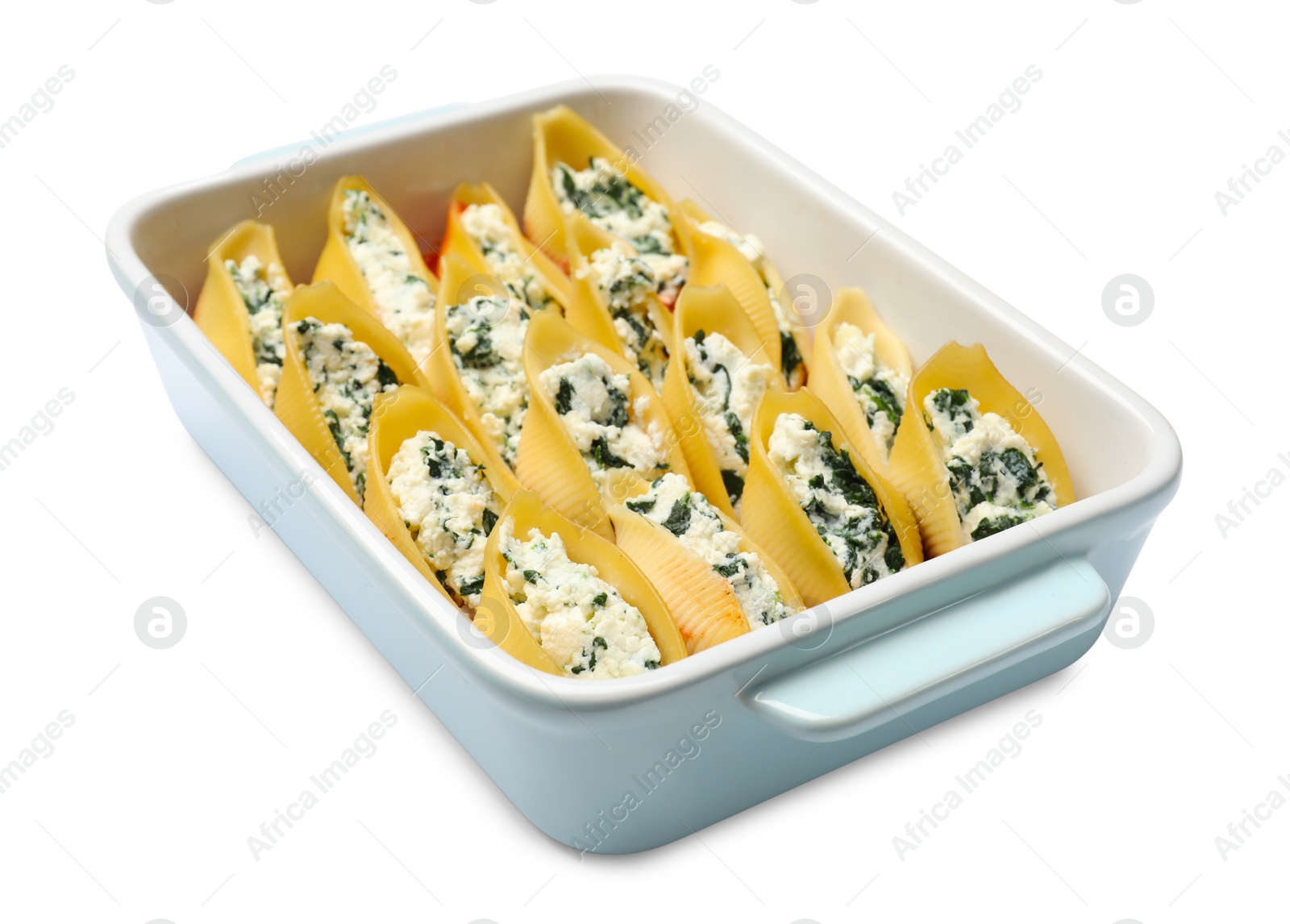 Photo of Delicious pasta with ricotta cheese and spinach in baking dish isolated on white