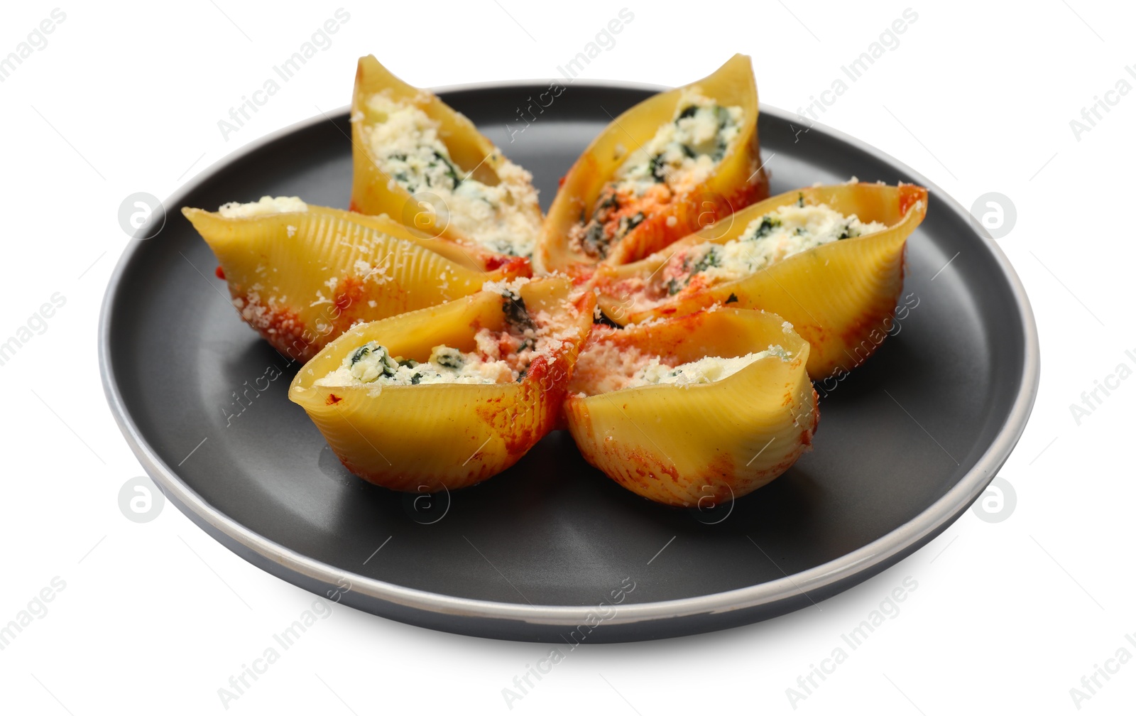 Photo of Delicious shell pasta stuffed with ricotta and spinach isolated on white