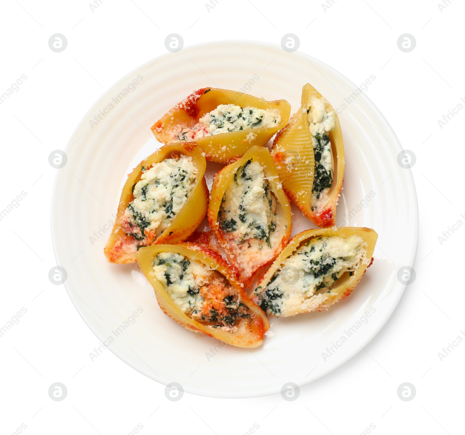 Photo of Delicious shell pasta stuffed with ricotta and spinach isolated on white, top view