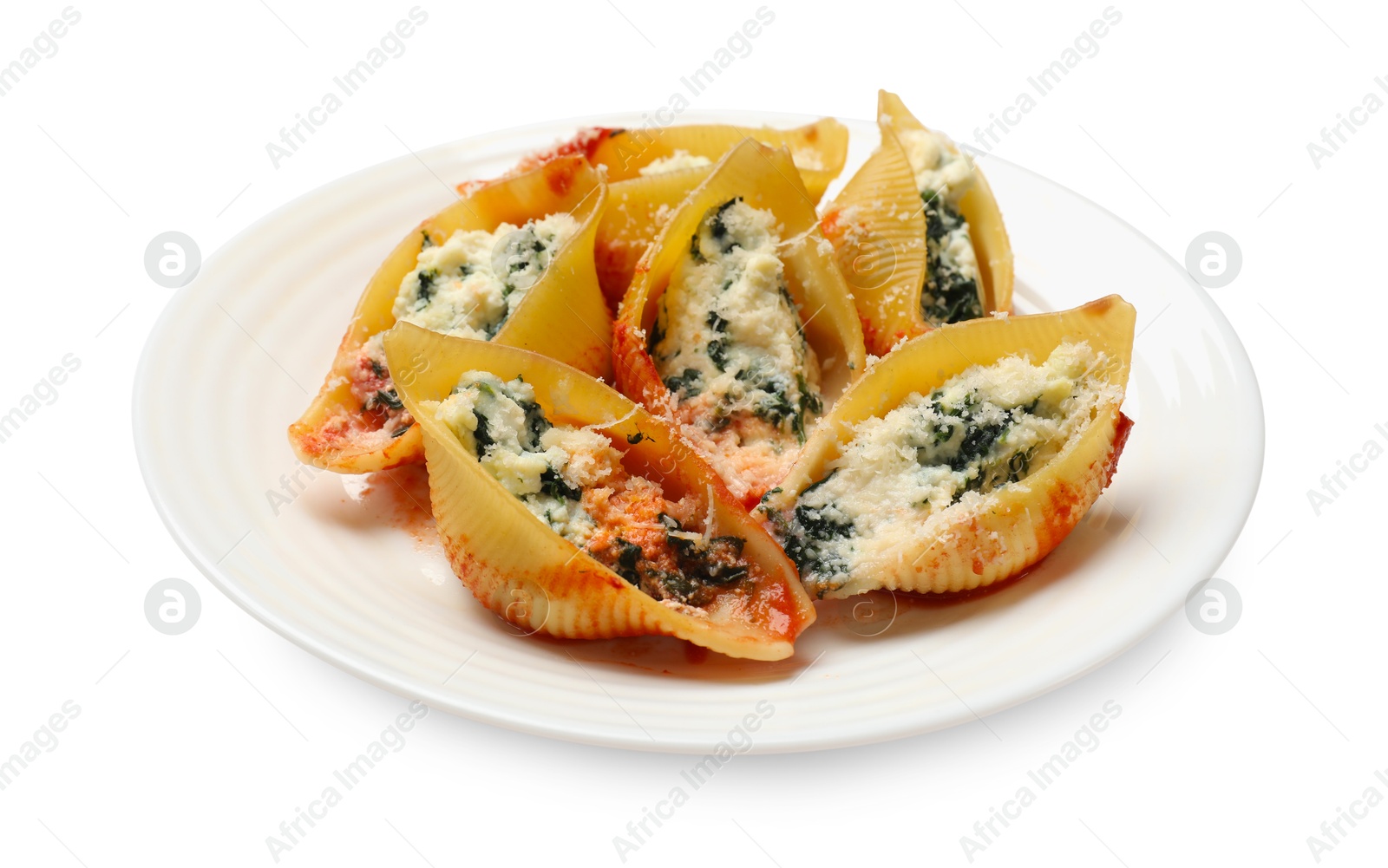 Photo of Delicious shell pasta stuffed with ricotta and spinach isolated on white