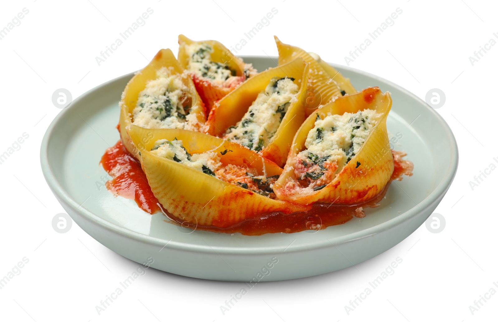 Photo of Delicious shell pasta stuffed with ricotta and spinach isolated on white