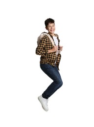 Photo of Teenage boy with backpack jumping on white background