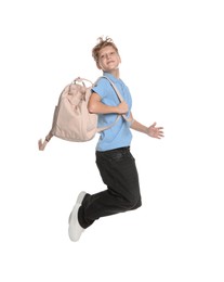 Photo of Teenage boy with backpack jumping on white background