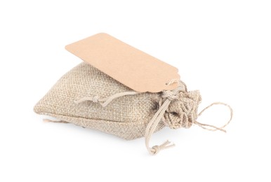 Photo of Burlap bag with tag isolated on white