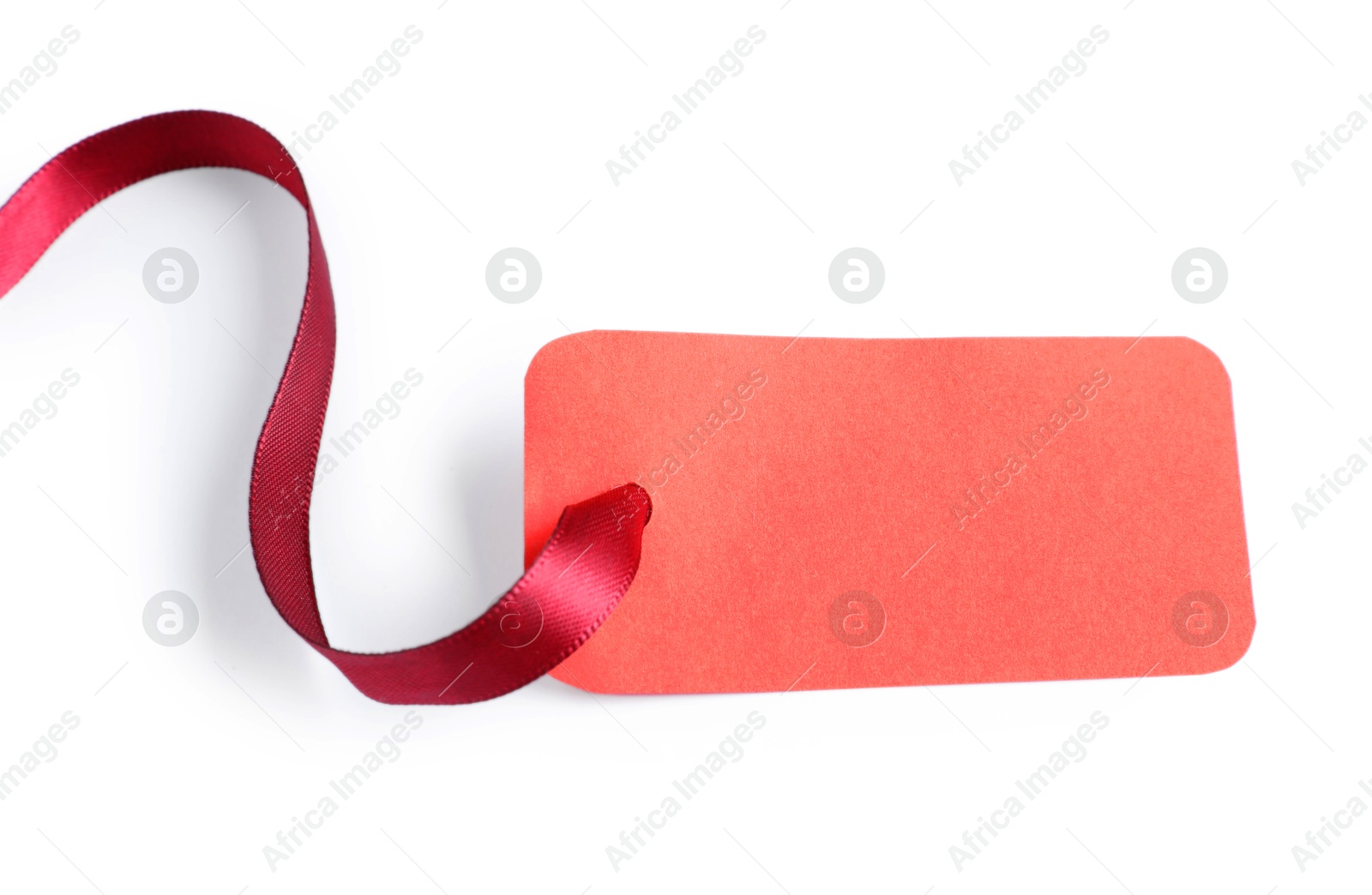 Photo of Blank tag with ribbon isolated on white