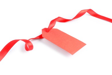 Photo of Blank tag with ribbon isolated on white