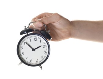 Photo of Man with black alarm clock on white background, closeup