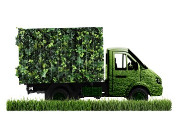 Image of Eco-friendly transportation. Truck covered with green lush grass on white background