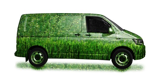 Image of Eco-friendly transportation. Minibus with green floral pattern on white background