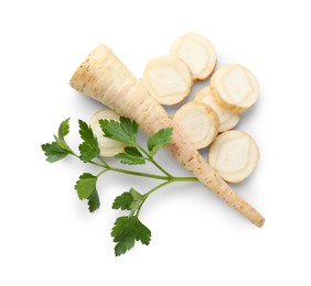 Photo of Fresh parsley and cut roots isolated on white, top view