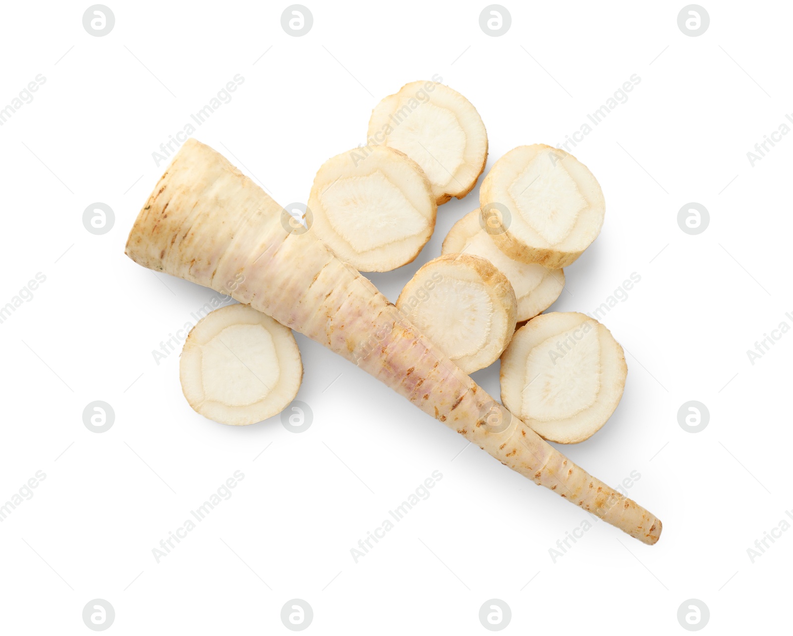 Photo of Cut fresh parsley roots isolated on white, top view