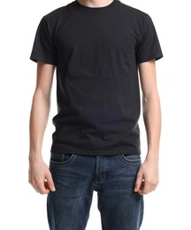 Photo of Young man wearing blank black t-shirt on white background, closeup. Mockup for design