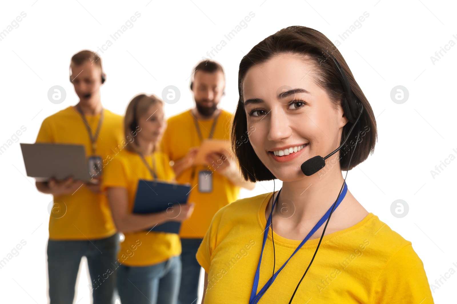 Photo of Technical support call center. Team of friendly operators on white background