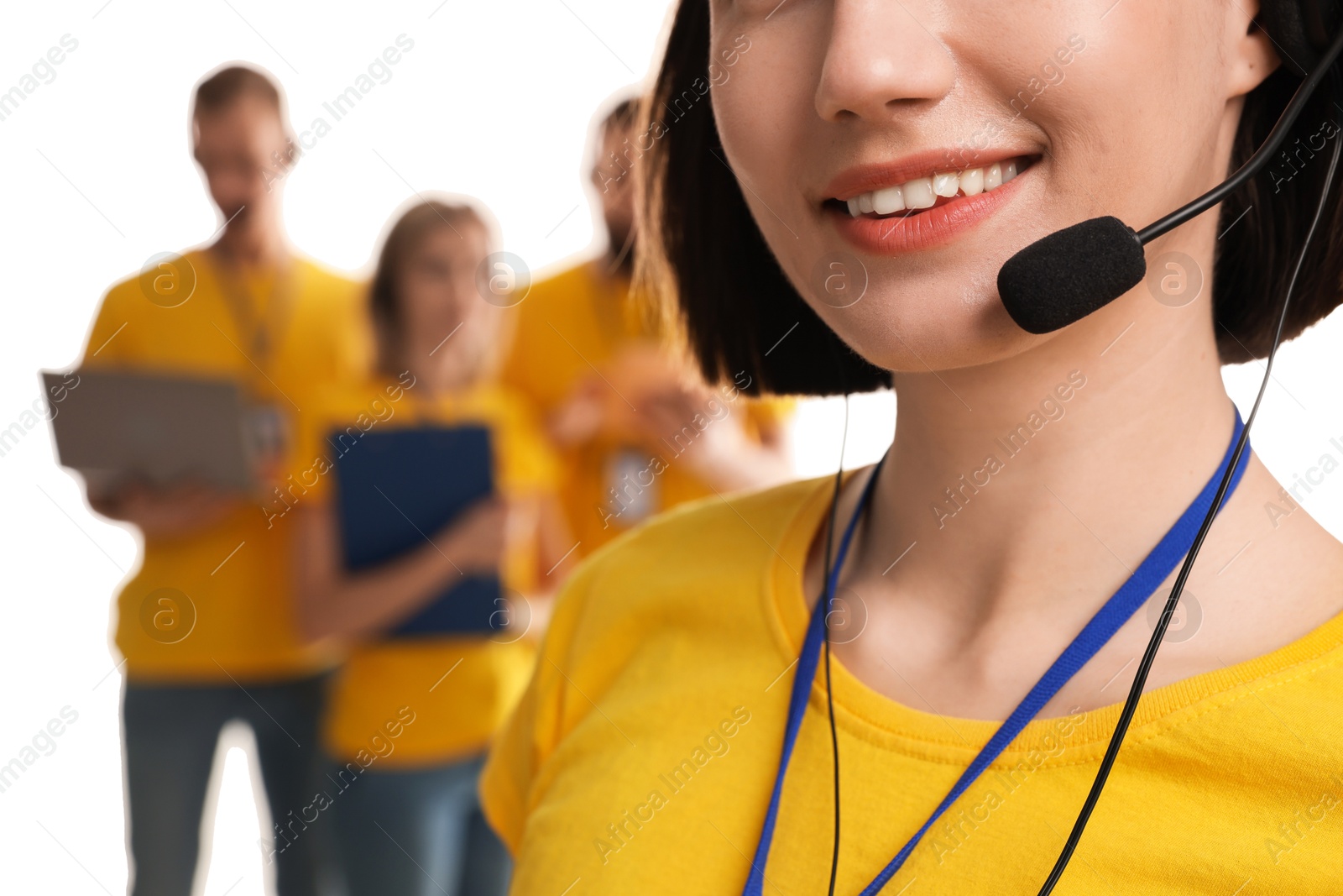 Photo of Technical support call center. Smiling operator on white background, closeup