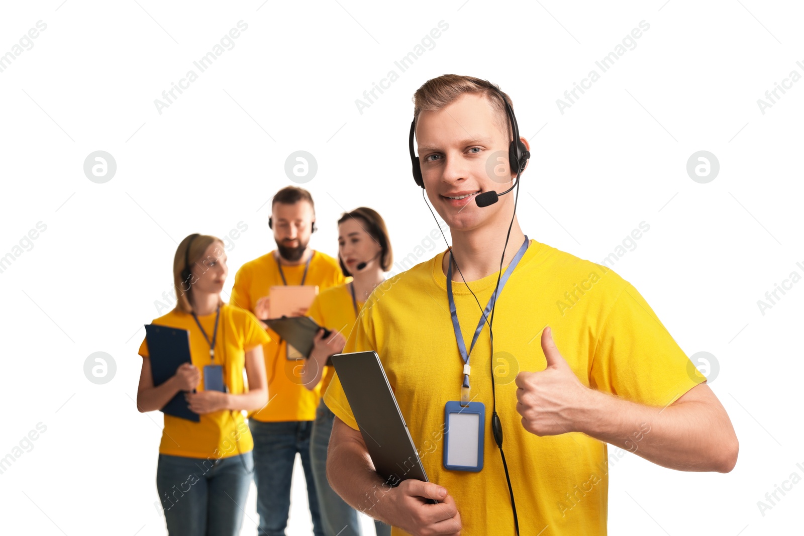 Photo of Technical support call center. Team of friendly operators on white background