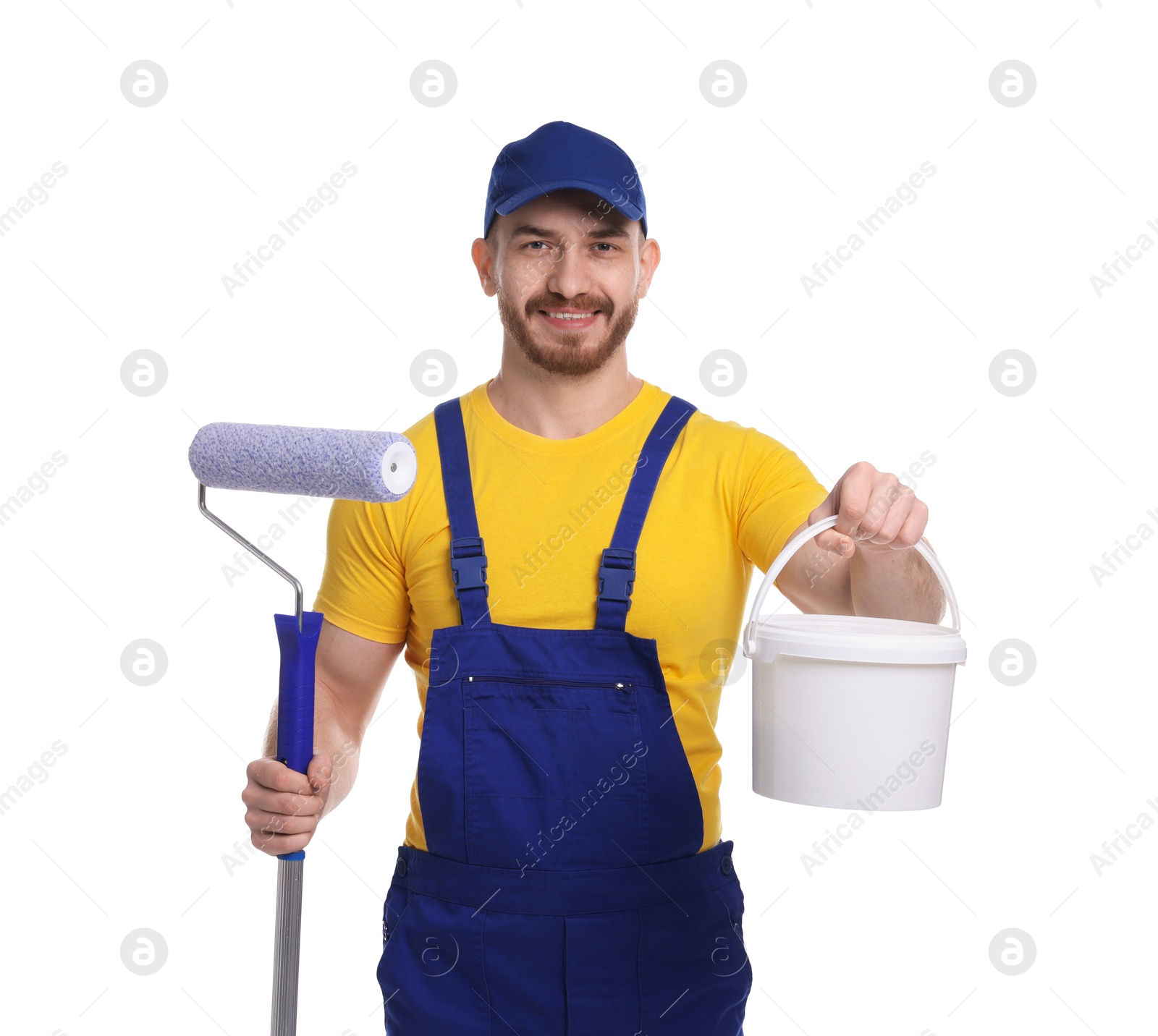 Photo of Professional painter with roller and bucket of paint on white background