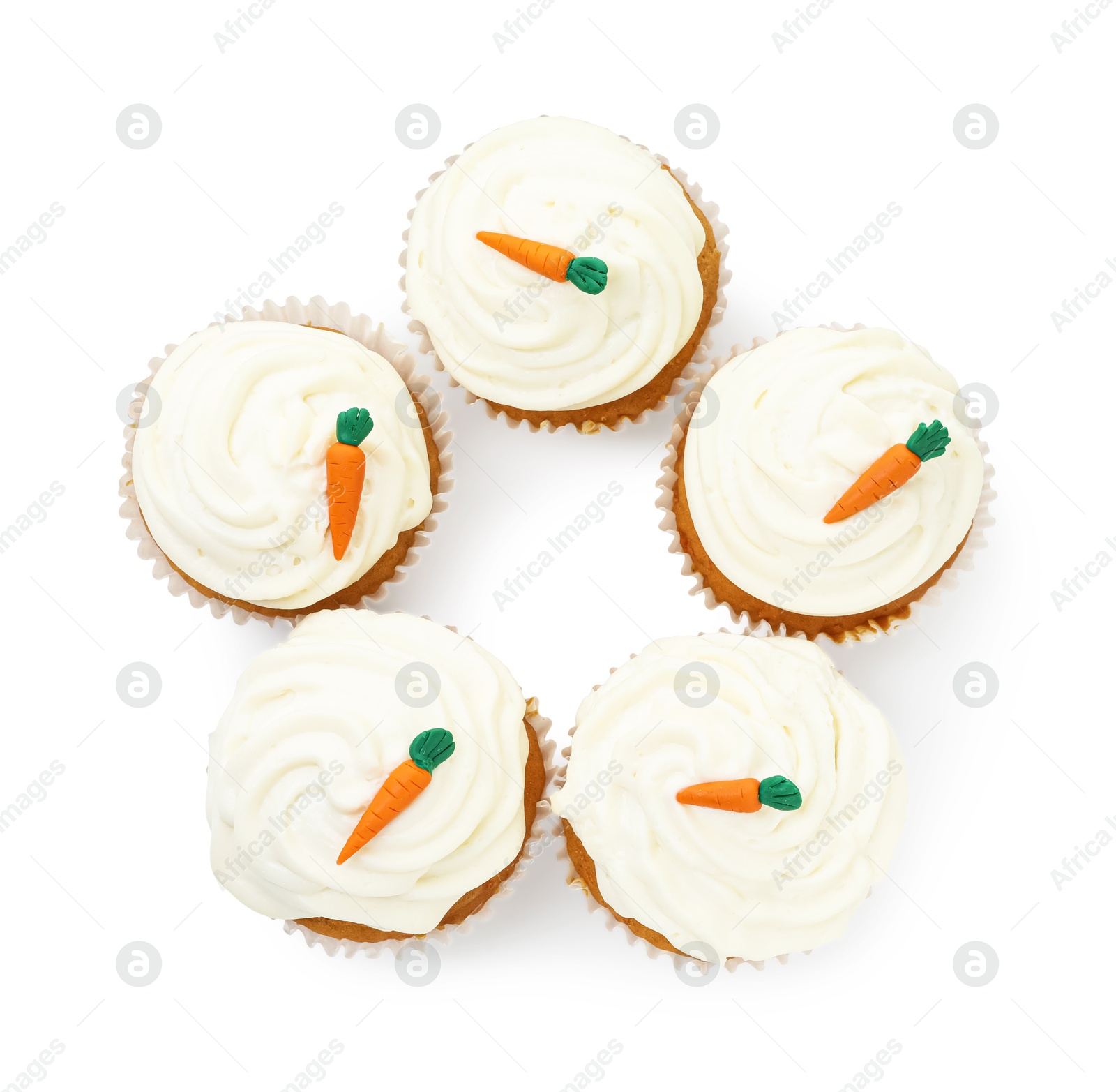 Photo of Delicious carrot cupcakes isolated on white, top view