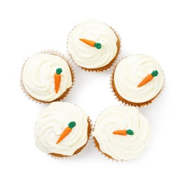 Photo of Delicious carrot cupcakes isolated on white, top view