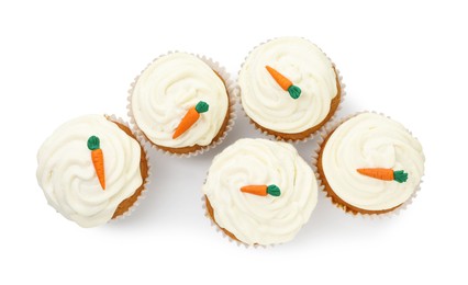 Photo of Delicious carrot cupcakes isolated on white, top view