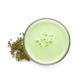 Photo of Fresh mung bean juice in glass and seeds isolated on white, top view