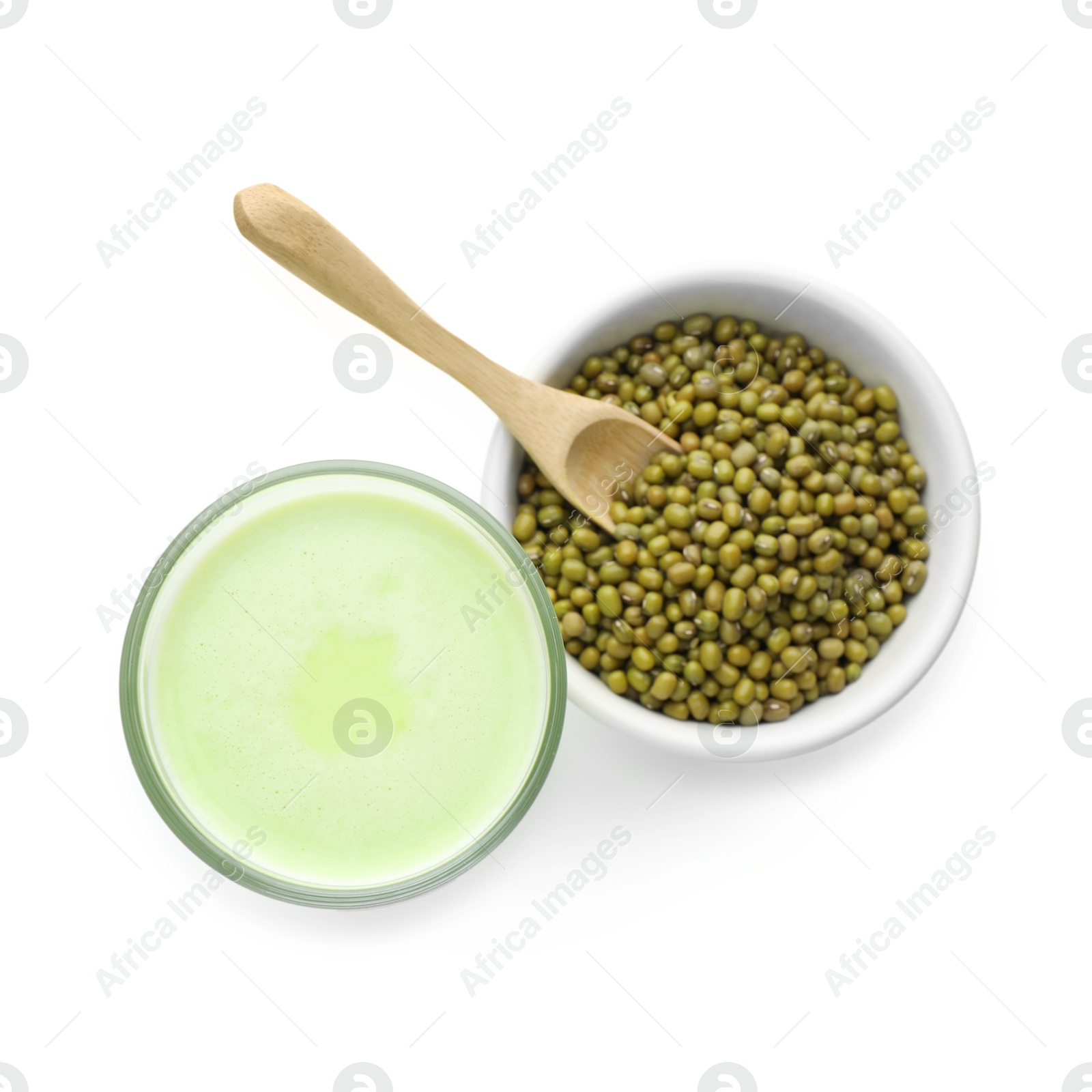 Fresh mung bean juice in glass and seeds isolated on white, top view Photo of Fresh mung bean juice in glass and seeds isolated on white, top view