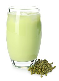 Photo of Fresh mung bean juice in glass and seeds isolated on white