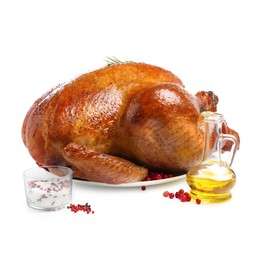 Photo of Whole baked turkey with rosemary, oil and spices isolated on white