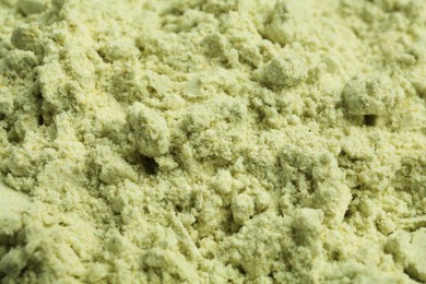 Photo of Dry wasabi powder as background, closeup view